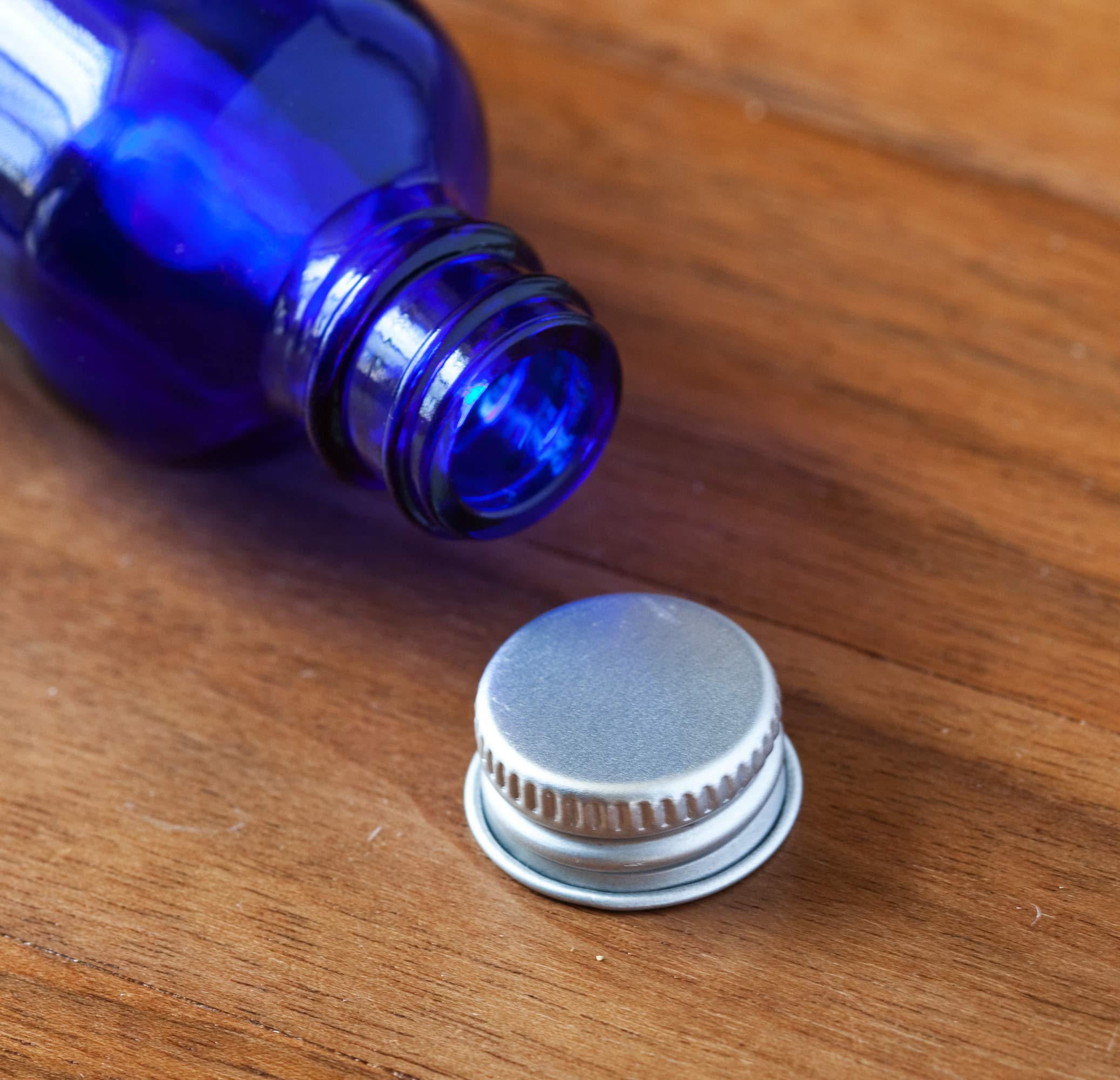 2 Oz Cobalt Blue Glass Boston Round Bottles With Silver Metal Screw On Caps (12 Pack) + Funnel